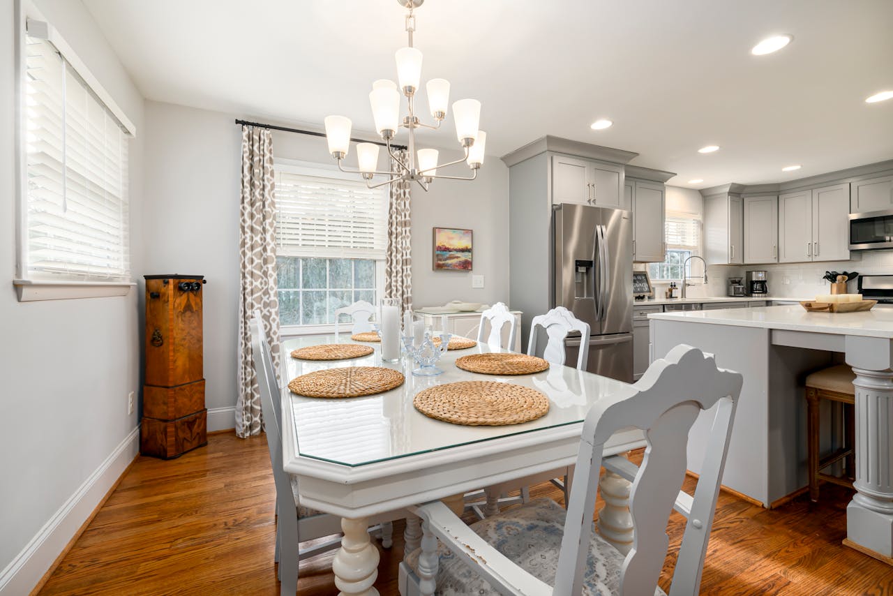 A Dining Table and Chairs with Brown Placemats